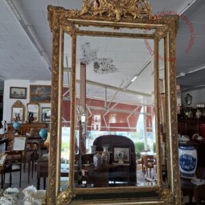 Specchiera con cornice dorata